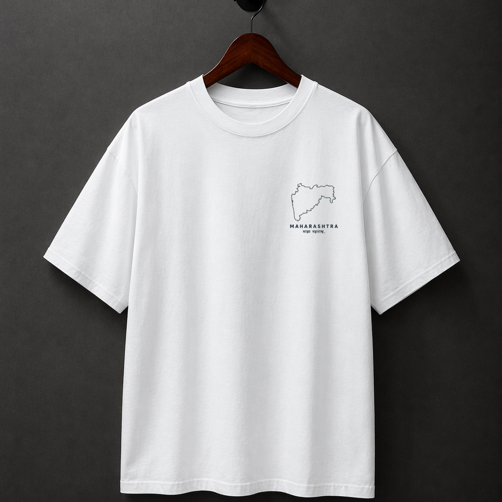 White t-shirt with a small logo on a hanger against a dark background